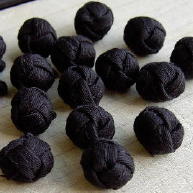 Black gabardine hand tied cloth knot buttons