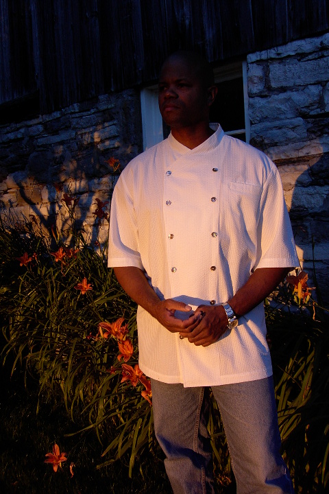 Chef Coat Style BSM101: Shown in White, 100% cotton seersucker, left chest tailored welt pocket, short sleeves & Abalone buttons.