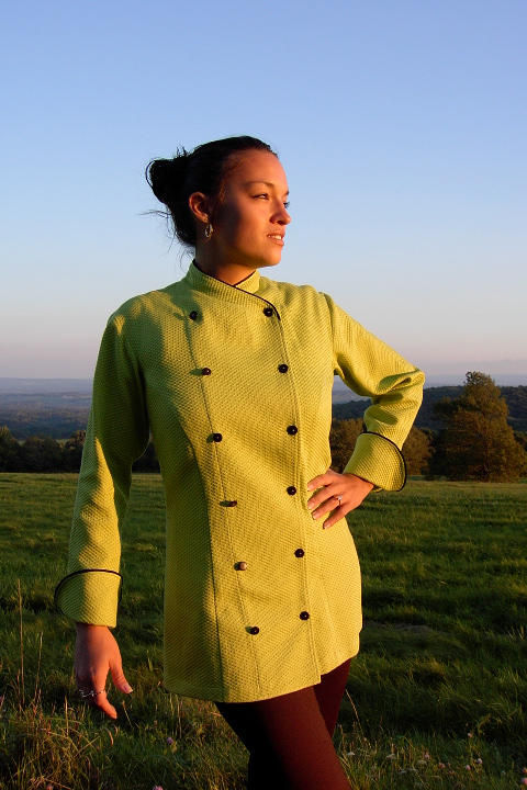 Women's Chef Coat Style BSW101: Shown in Kiwi, 100% cotton honeycomb pique, black piping (collar & cuffs) & pin shank buttons.