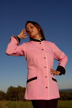 Women's Chef Coat Style BSW103: Shown in pink & black, 100% cotton petti point pique, ivory piping (collar, front, cuffs & pockets) two front hip tailored welt pockets, & metal on black horn horse head buttons.