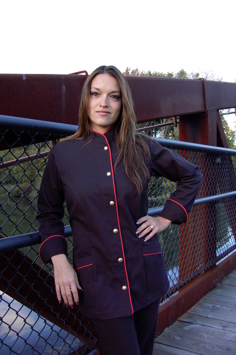 Women's Chef Coat Style BSW103: Shown in black, 100% cotton gabardine, red berry piping (collar, front, cuffs & pockets) two front hip tailored welt pockets, & brass buttons.
