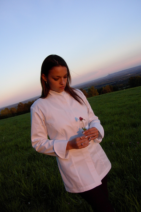 Women's Chef Coat Style CBW103H: Shown in white Supima gabardine, with left shoulder sleeve tailored welt pocket.