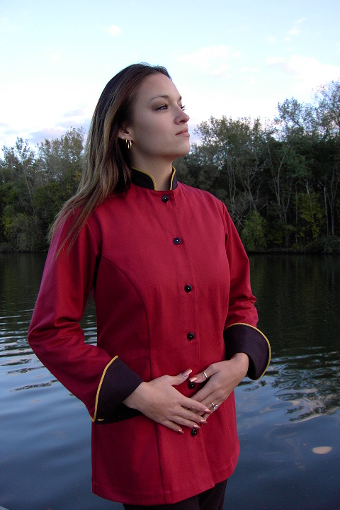 Women's Chef Coat Style BSW104: Shown in red & black, 100% cotton denim, two front hip tailored welt pockets, cheviot gold piping (collar, cuffs & pockets) & pin shank buttons.