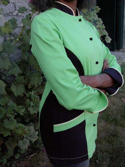 Women's Chef Coat Style BSW104: Shown in Lime & black, 100% cotton denim, piping (collar, pockets & cuffs) two front hip tailored welt pockets, & hand tied knot buttons.