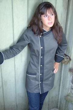 Women's Chef Coat Style BSW105: Shown in graphite & charcoal, 100% cotton gabardine, with natural white piping, two front-hip tailored welt pockets, & concho buttons.